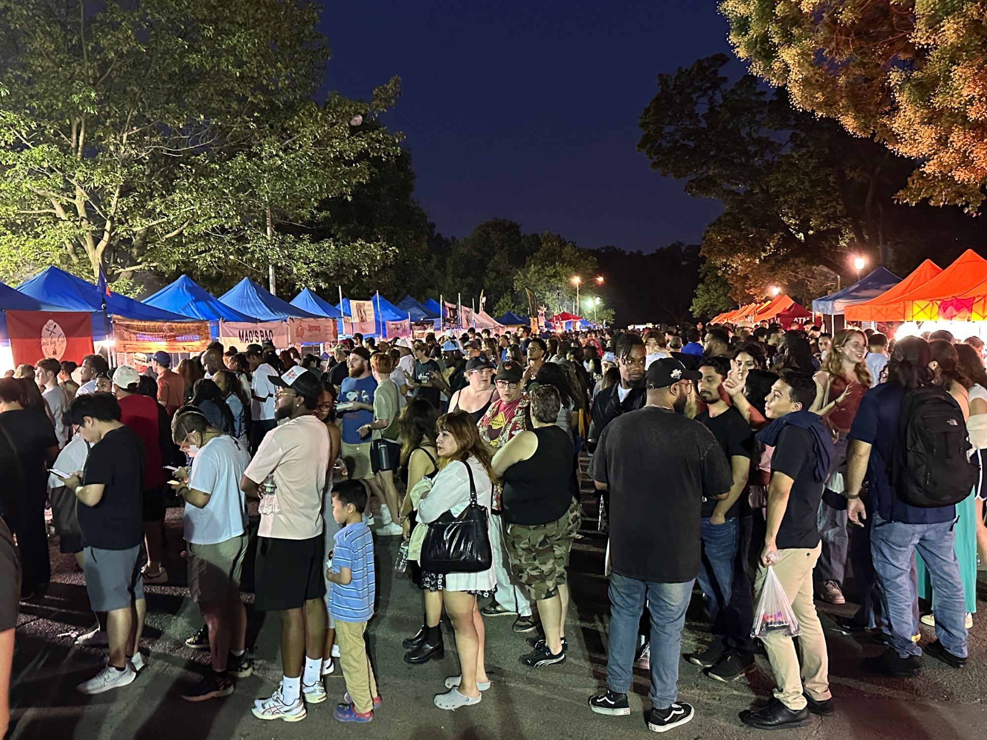 Crowds at the Queens Night Market in Flushing Meadows Corona Park