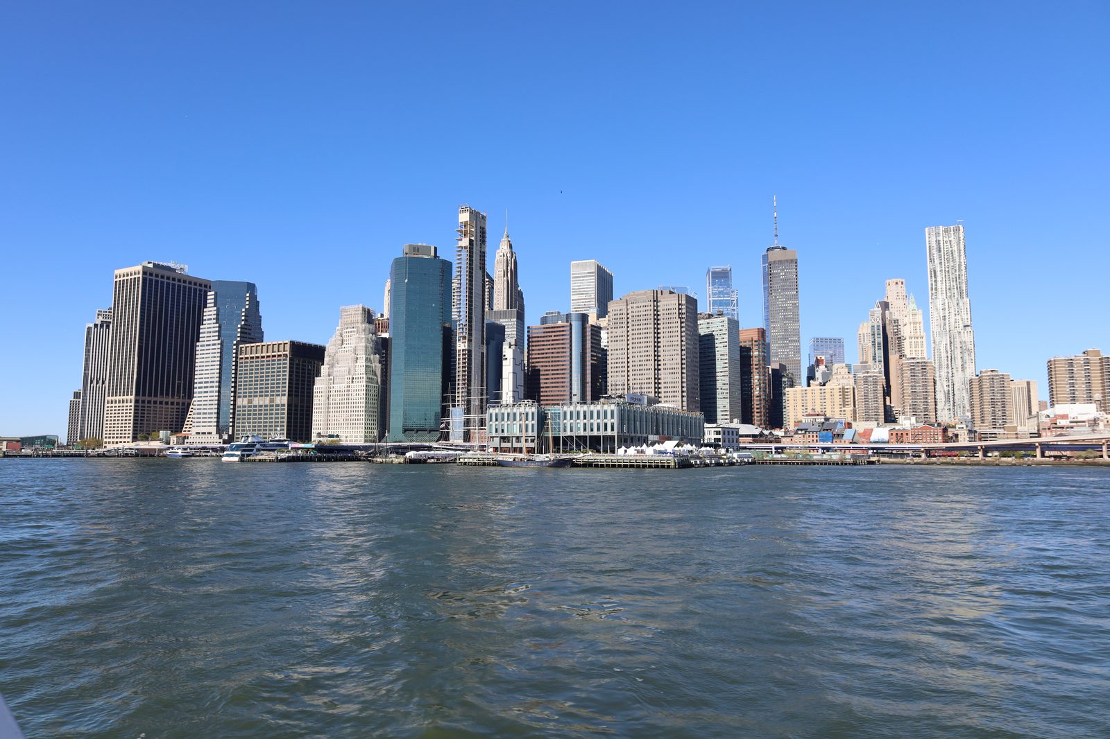 The Lower Manhattan skyline seen from an NYC Ferry boat on the East River