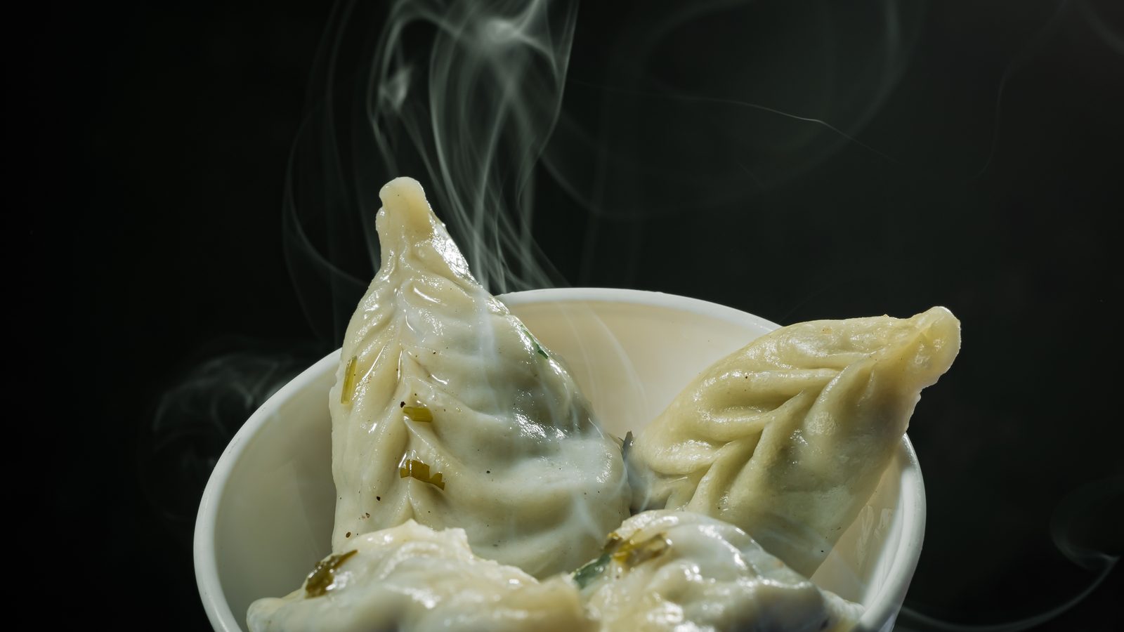 Steamed Himalayan momo dumplings in a bowl